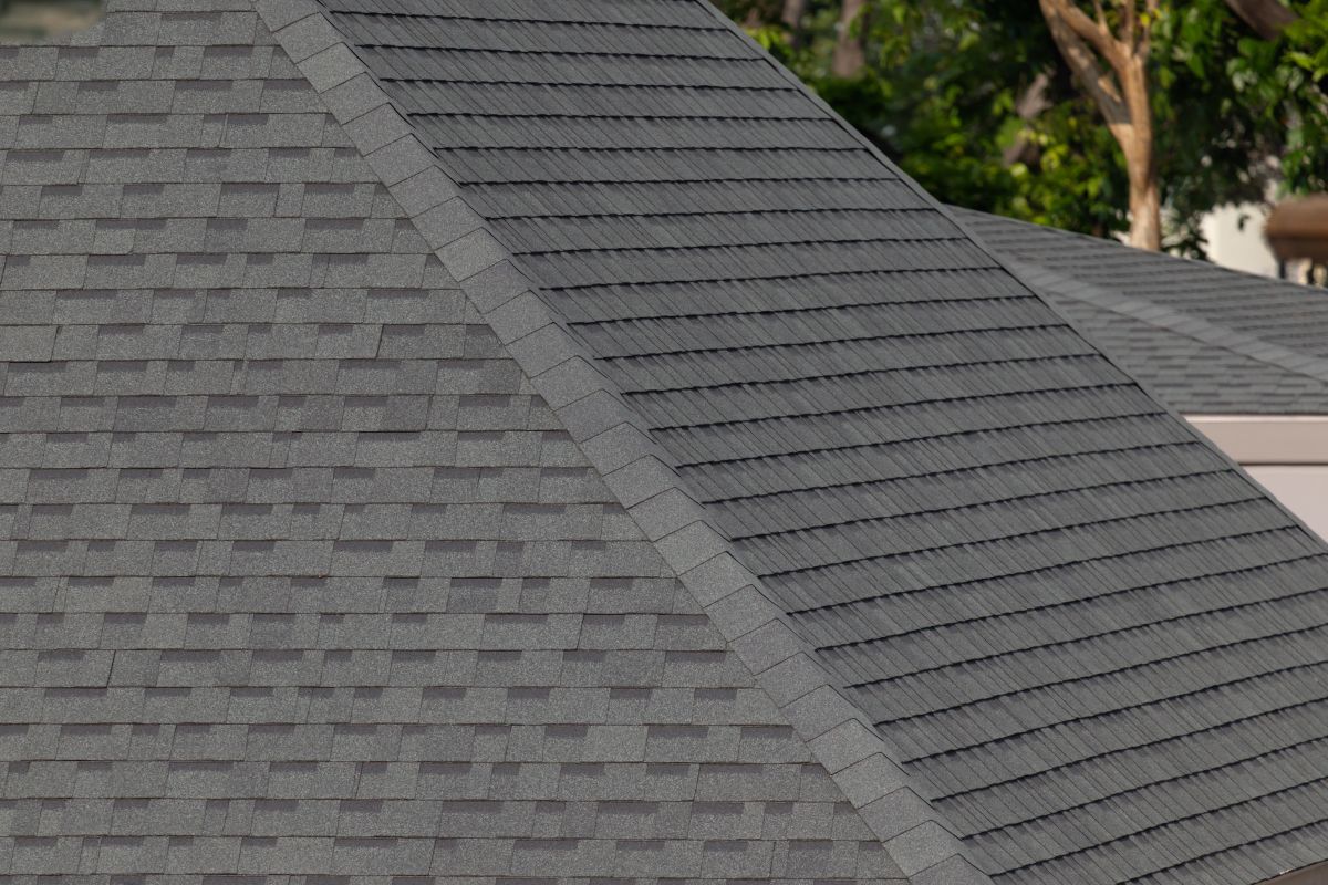 Dark gray shingles line a sloped roof with neat rows, Edina