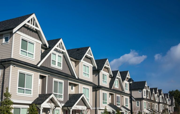 grey apartment buildings with shingle roofs, Edina